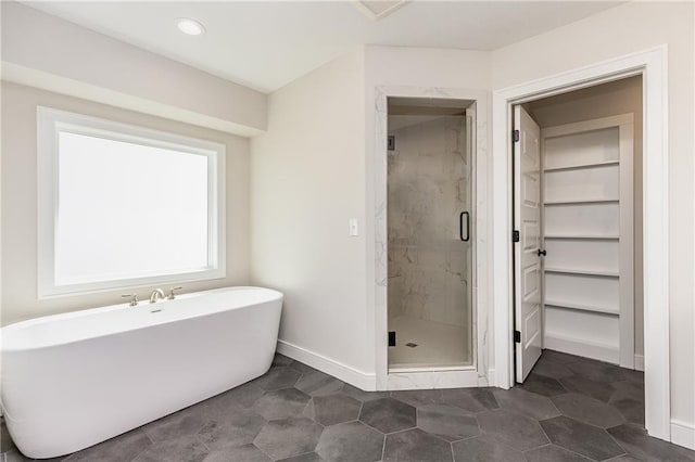 3361 W 187th St, Overland Park, KS 66085 - full bathroom featuring a stall shower, a soaking tub, and recessed lighting