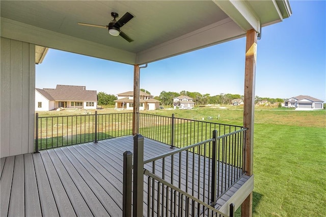 3361 W 187th St, Overland Park, KS 66085 - wooden terrace with ceiling fan, a lawn, and a residential view