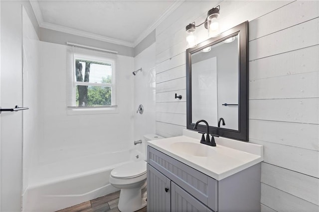 1313 S Clark Ave, Independence, MO 64057 - bathroom with ornamental molding, wood finished floors, vanity, and  shower combination