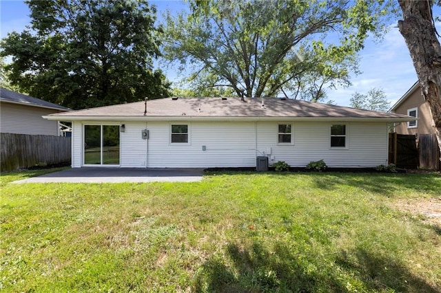 1313 S Clark Ave, Independence, MO 64057 - rear view of property with a patio area