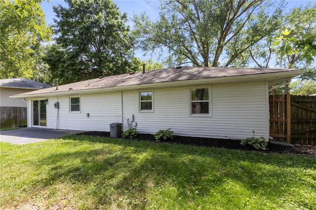 1313 S Clark Ave, Independence, MO 64057 - rear view of house featuring a patio