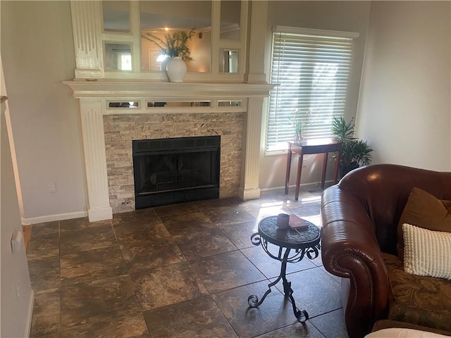 24445 E Truman Rd, Independence, MO 64056 - living room featuring a fireplace and baseboards