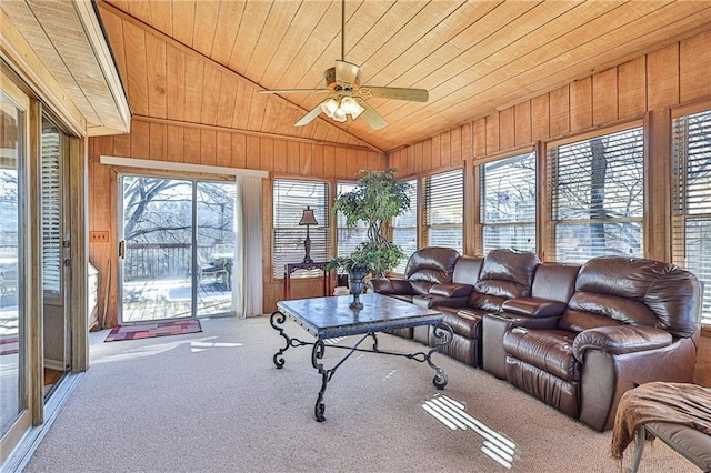 24445 E Truman Rd, Independence, MO 64056 - sunroom with lofted ceiling, carpet floors, wooden ceiling, and wooden walls
