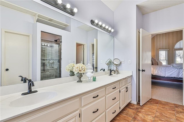 24445 E Truman Rd, Independence, MO 64056 - bathroom with double vanity, ensuite bathroom, and a shower stall
