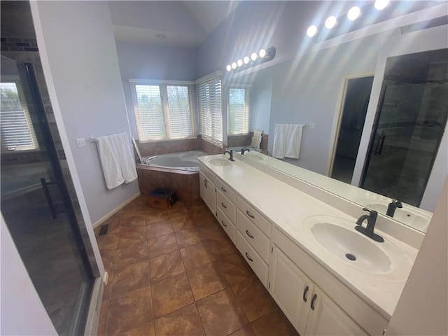 24445 E Truman Rd, Independence, MO 64056 - bathroom with a garden tub, double vanity, and a shower stall
