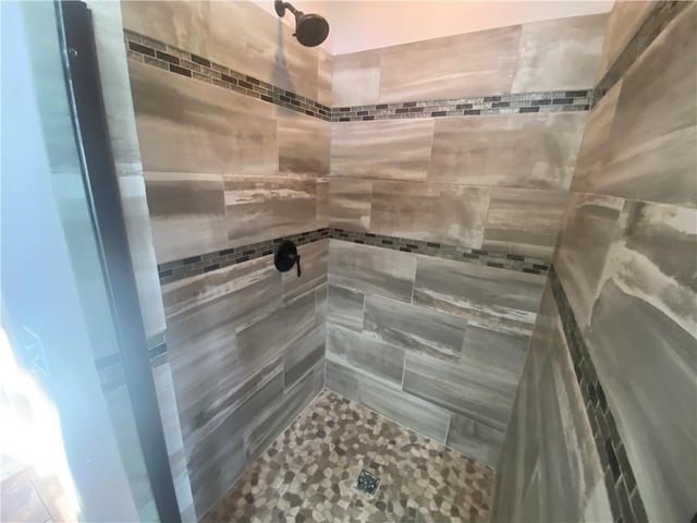 24445 E Truman Rd, Independence, MO 64056 - bathroom with a tile shower and tile patterned flooring