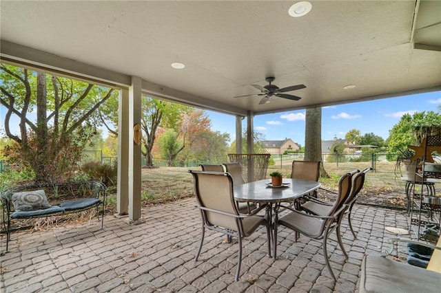 24445 E Truman Rd, Independence, MO 64056 - view of patio featuring a ceiling fan and outdoor dining area
