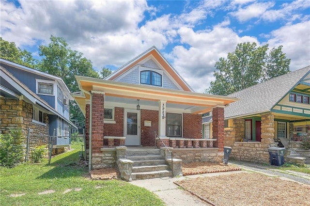 3923 Campbell St, Kansas City, MO 64110 - view of front of home with a porch