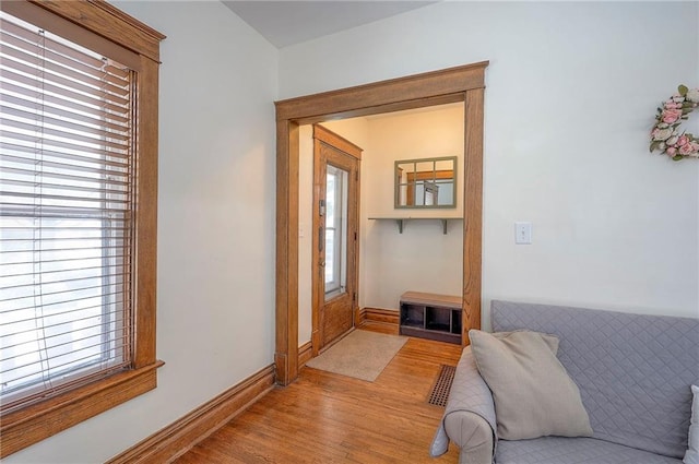 3923 Campbell St, Kansas City, MO 64110 - corridor featuring light wood-style floors and baseboards