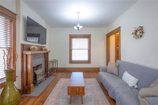 3923 Campbell St, Kansas City, MO 64110 - living area with wood finished floors and baseboards