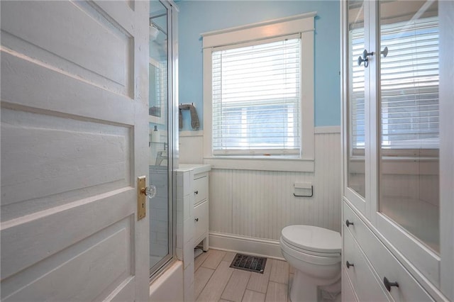 3923 Campbell St, Kansas City, MO 64110 - bathroom with a wainscoted wall, healthy amount of natural light, and vanity