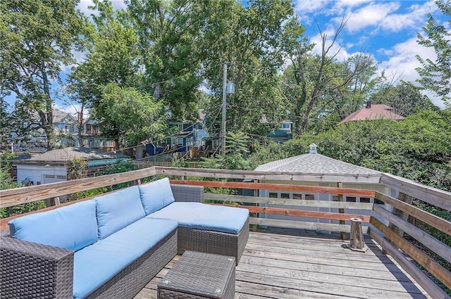 3923 Campbell St, Kansas City, MO 64110 - wooden terrace with outdoor lounge area