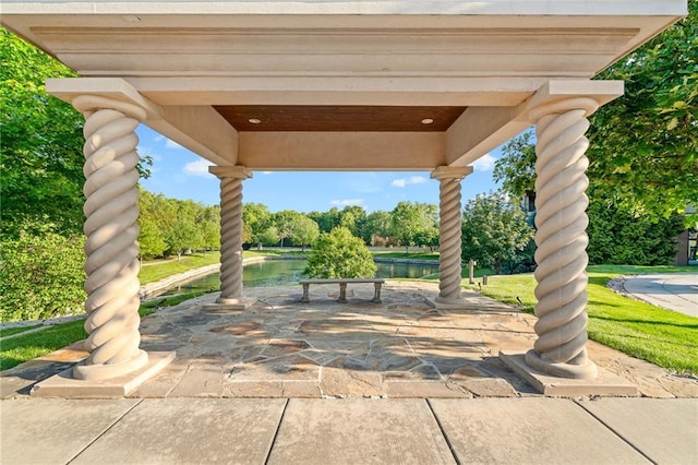 3116 W 137th St, Leawood, KS 66224 - view of patio featuring a water view