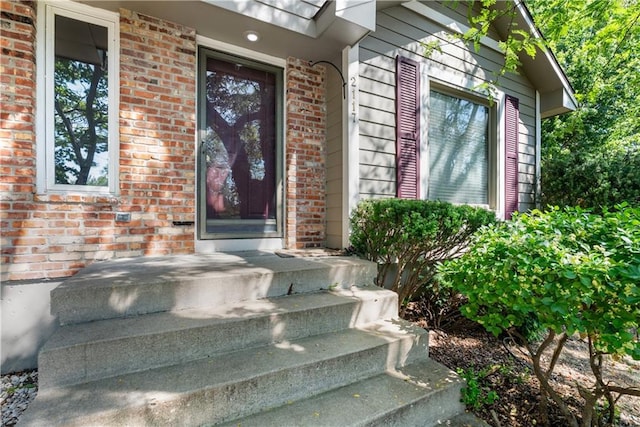 2117 Parker Ct, Blue Springs, MO 64015 - property entrance featuring brick siding