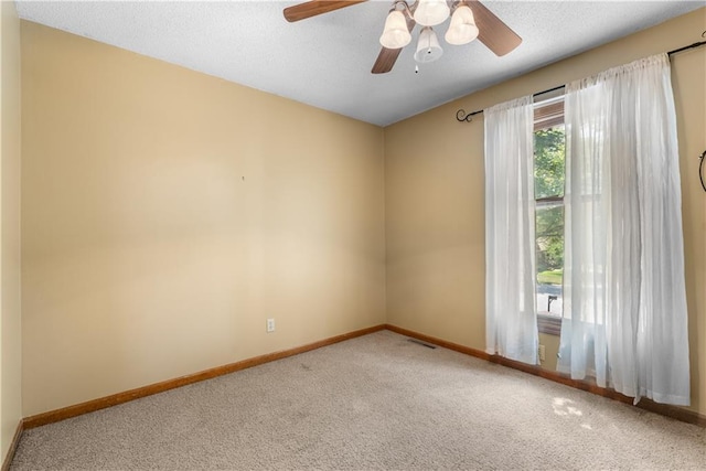2117 Parker Ct, Blue Springs, MO 64015 - carpeted empty room with baseboards and ceiling fan
