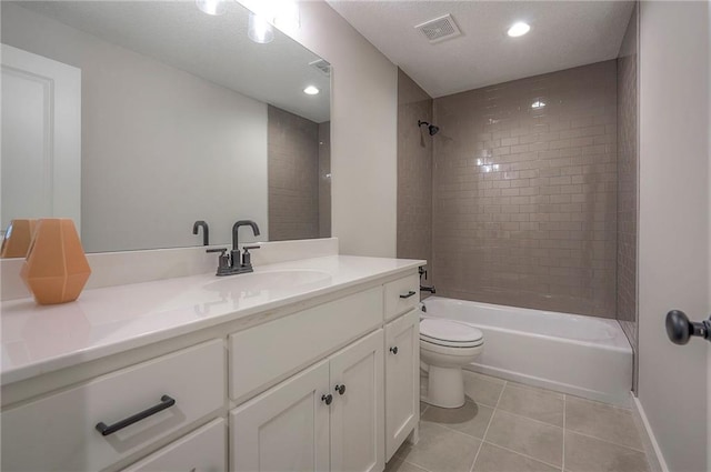 6753 Longview St, Shawnee, KS 66218 - bathroom with vanity, tile patterned floors, shower / bathtub combination, and recessed lighting