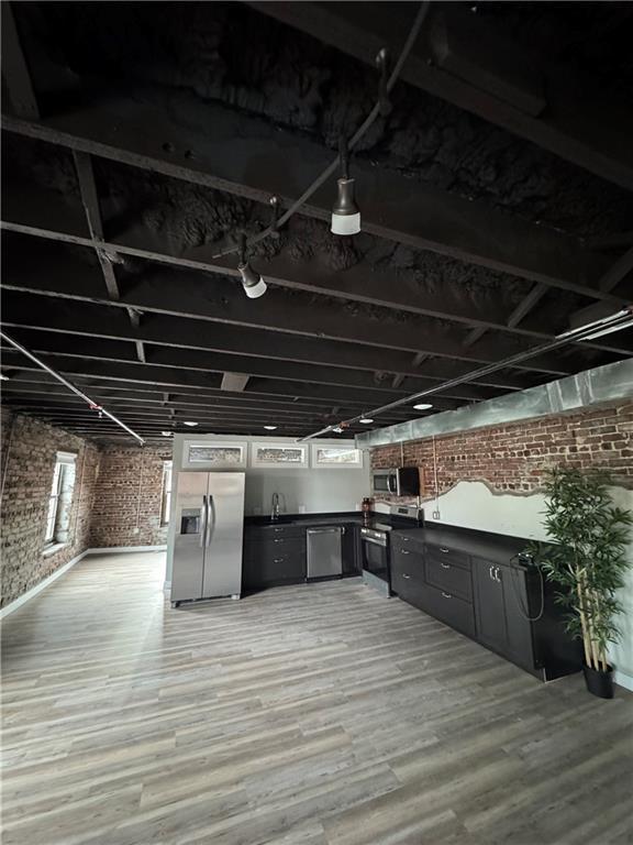 1018 Missouri Ave, Kansas City, MO 64106 - deck with exterior kitchen and a sink