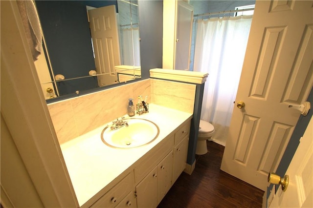 109 SE Rockwood St, Blue Springs, MO 64014 - bathroom with vanity, wood finished floors, and a shower with curtain