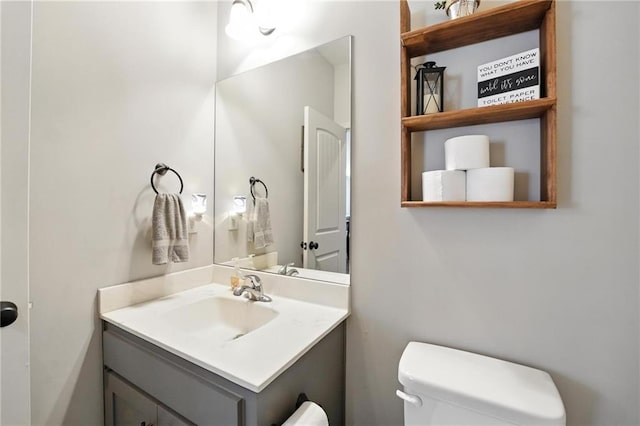 1016 SE Forest Ridge Ct, Blue Springs, MO 64014 - half bathroom featuring toilet and vanity