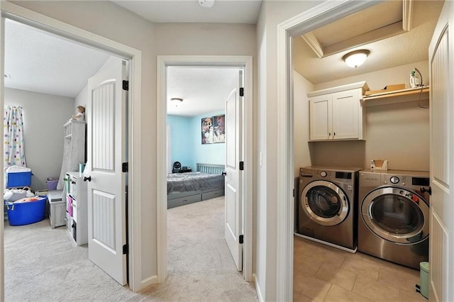 1016 SE Forest Ridge Ct, Blue Springs, MO 64014 - laundry room with separate washer and dryer, light carpet, attic access, and cabinet space