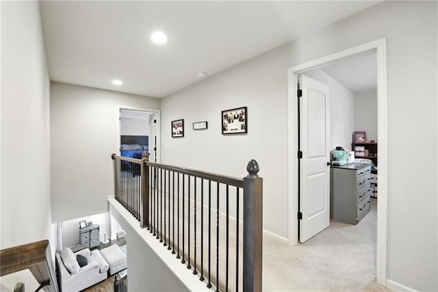 1016 SE Forest Ridge Ct, Blue Springs, MO 64014 - hallway featuring an upstairs landing, light colored carpet, and recessed lighting