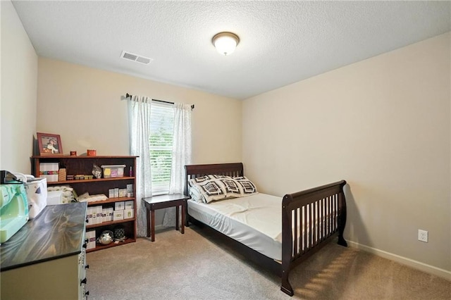 1016 SE Forest Ridge Ct, Blue Springs, MO 64014 - carpeted bedroom with a textured ceiling