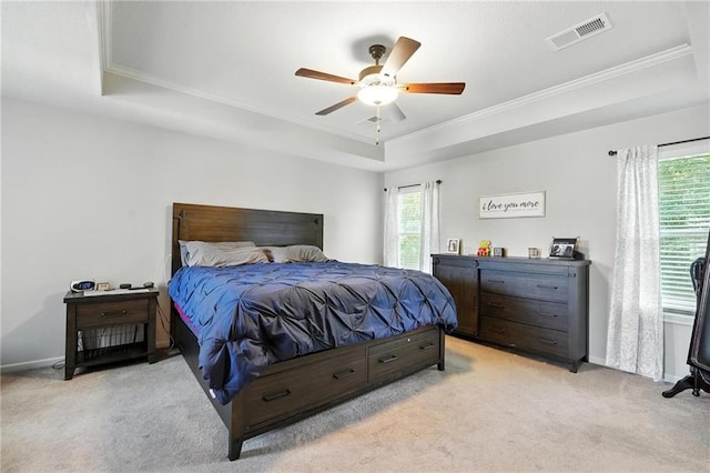 1016 SE Forest Ridge Ct, Blue Springs, MO 64014 - bedroom with a raised ceiling, ornamental molding, light carpet, and a ceiling fan