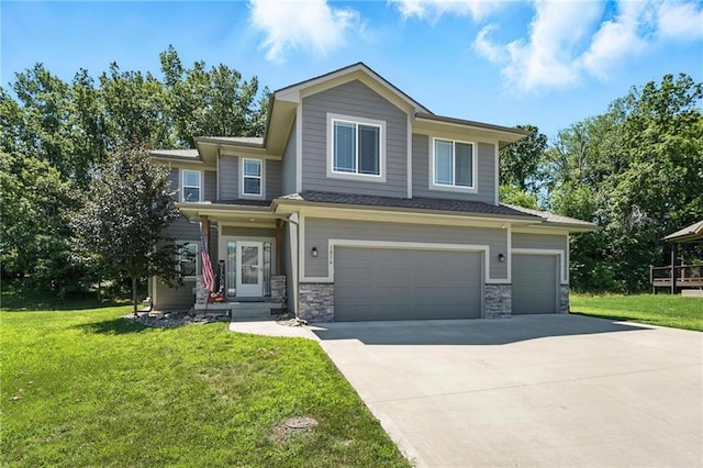 1016 SE Forest Ridge Ct, Blue Springs, MO 64014 - view of front of home featuring an attached garage, concrete driveway, a front lawn, and stone siding