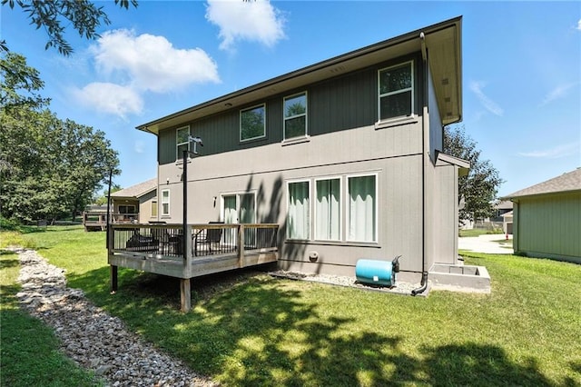 1016 SE Forest Ridge Ct, Blue Springs, MO 64014 - back of property with a wooden deck and a lawn