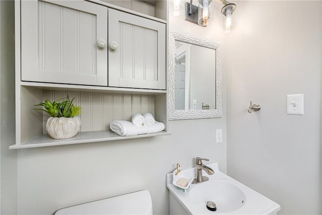 1806 E 125th St, Kansas City, MO 64146 - bathroom with a sink and toilet