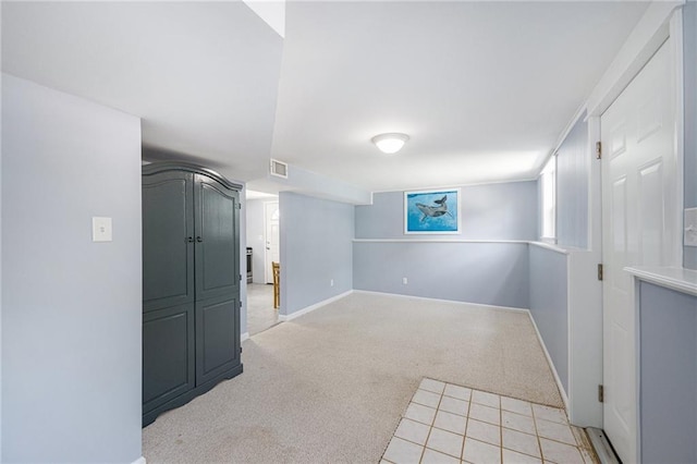 1806 E 125th St, Kansas City, MO 64146 - basement with light carpet and light tile patterned floors
