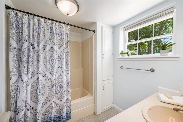 1806 E 125th St, Kansas City, MO 64146 - full bathroom with tile patterned floors, shower / bath combo with shower curtain, and vanity