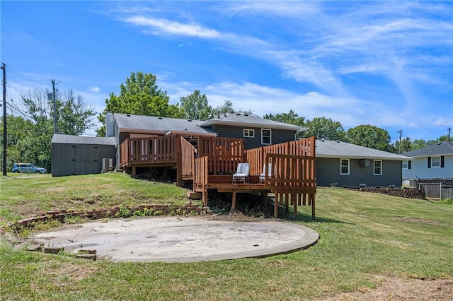 1806 E 125th St, Kansas City, MO 64146 - back of house with a wooden deck, a yard, and a shed