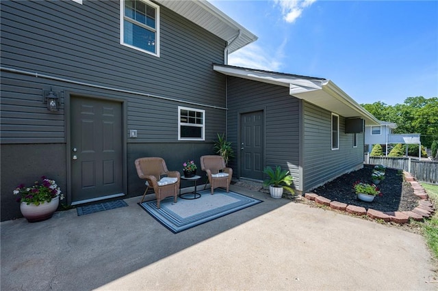 1806 E 125th St, Kansas City, MO 64146 - back of property featuring a patio
