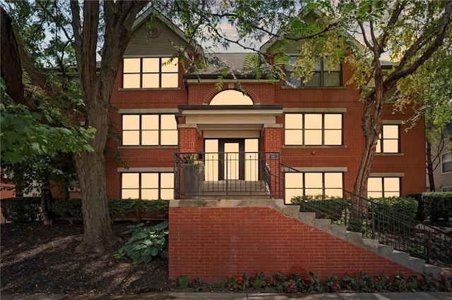 435 W 9th St Unit 204, Kansas City, MO 64105 - view of front of property with brick siding and stairway