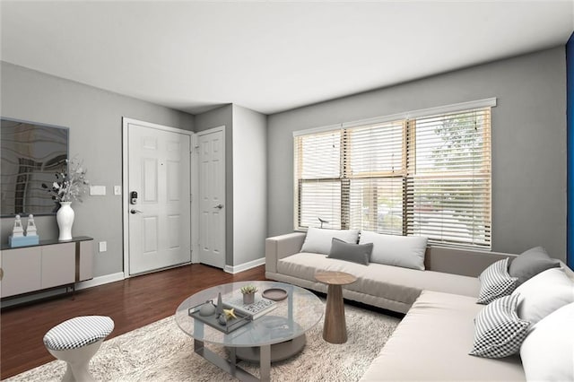 435 W 9th St Unit 204, Kansas City, MO 64105 - living area featuring wood finished floors and healthy amount of natural light