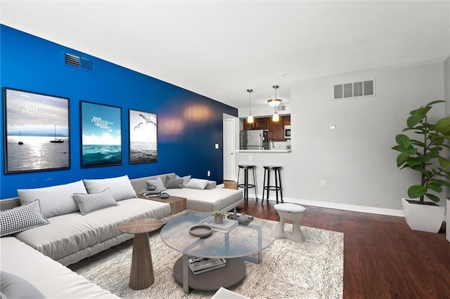 435 W 9th St Unit 204, Kansas City, MO 64105 - living area with wood finished floors and baseboards