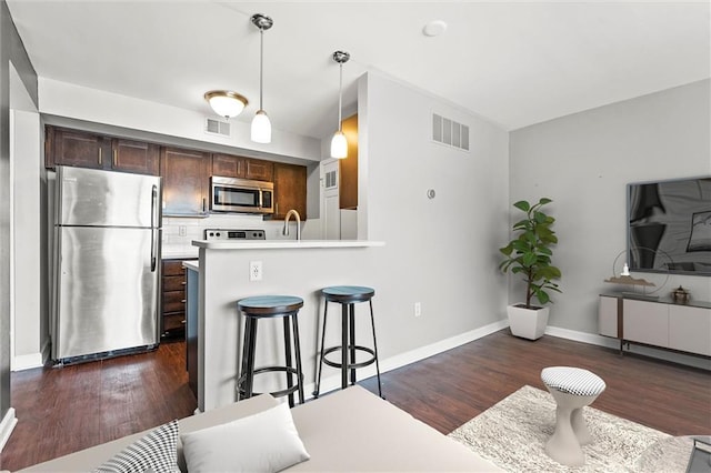 435 W 9th St Unit 204, Kansas City, MO 64105 - living area with dark wood-type flooring