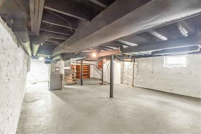 2647 Minnesota Ave, Kansas City, KS 66102 - basement featuring heating unit and stairway