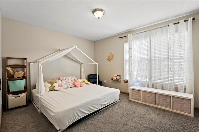 1005 Granada Dr, Raymore, MO 64083 - bedroom with dark colored carpet