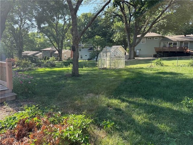 8812 W 72nd St, Overland Park, KS 66204 - fenced backyard with an exterior structure, an outbuilding, and a residential view