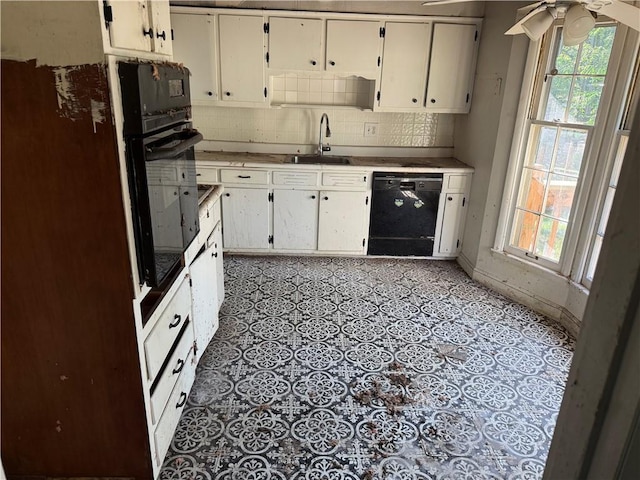 8812 W 72nd St, Overland Park, KS 66204 - kitchen with black appliances, plenty of natural light, a ceiling fan, and tasteful backsplash