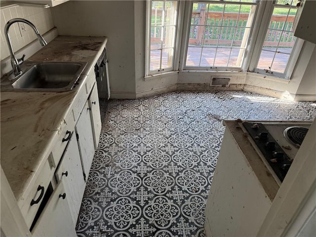8812 W 72nd St, Overland Park, KS 66204 - kitchen with a sink and white cabinetry