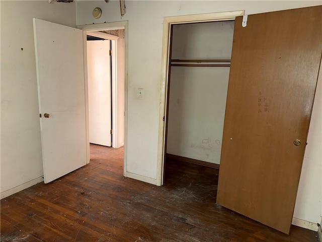 8812 W 72nd St, Overland Park, KS 66204 - unfurnished bedroom featuring hardwood / wood-style flooring and a closet