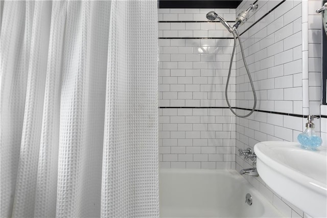 6000 Cherry St, Kansas City, MO 64110 - full bathroom featuring shower / bath combo with shower curtain