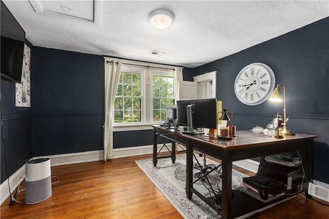 6000 Cherry St, Kansas City, MO 64110 - office with light wood finished floors, attic access, and a textured ceiling