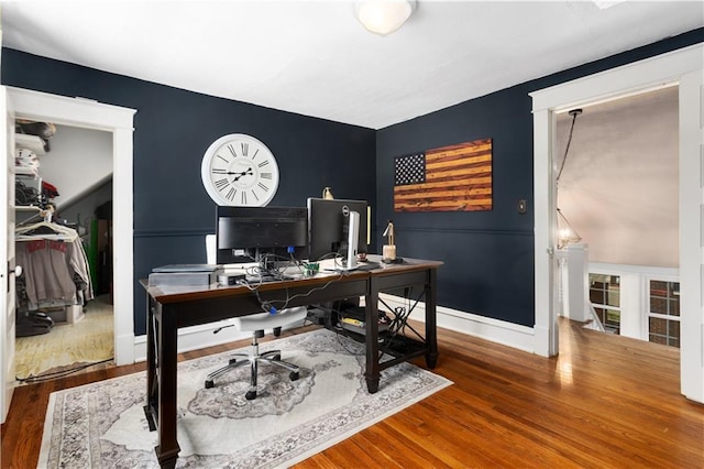 6000 Cherry St, Kansas City, MO 64110 - office area with wood finished floors and baseboards