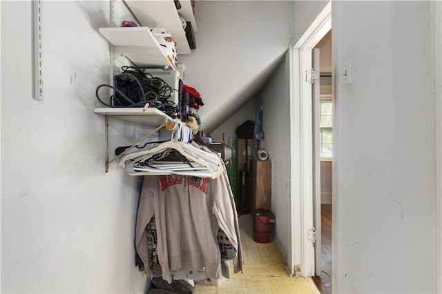 6000 Cherry St, Kansas City, MO 64110 - spacious closet with wood finished floors