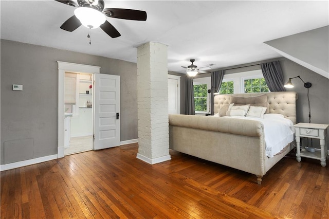 6000 Cherry St, Kansas City, MO 64110 - bedroom featuring hardwood / wood-style floors, ceiling fan, and ornate columns