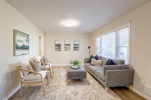10201 Hillcrest Rd, Kansas City, MO 64134 - living area with wood finished floors and baseboards